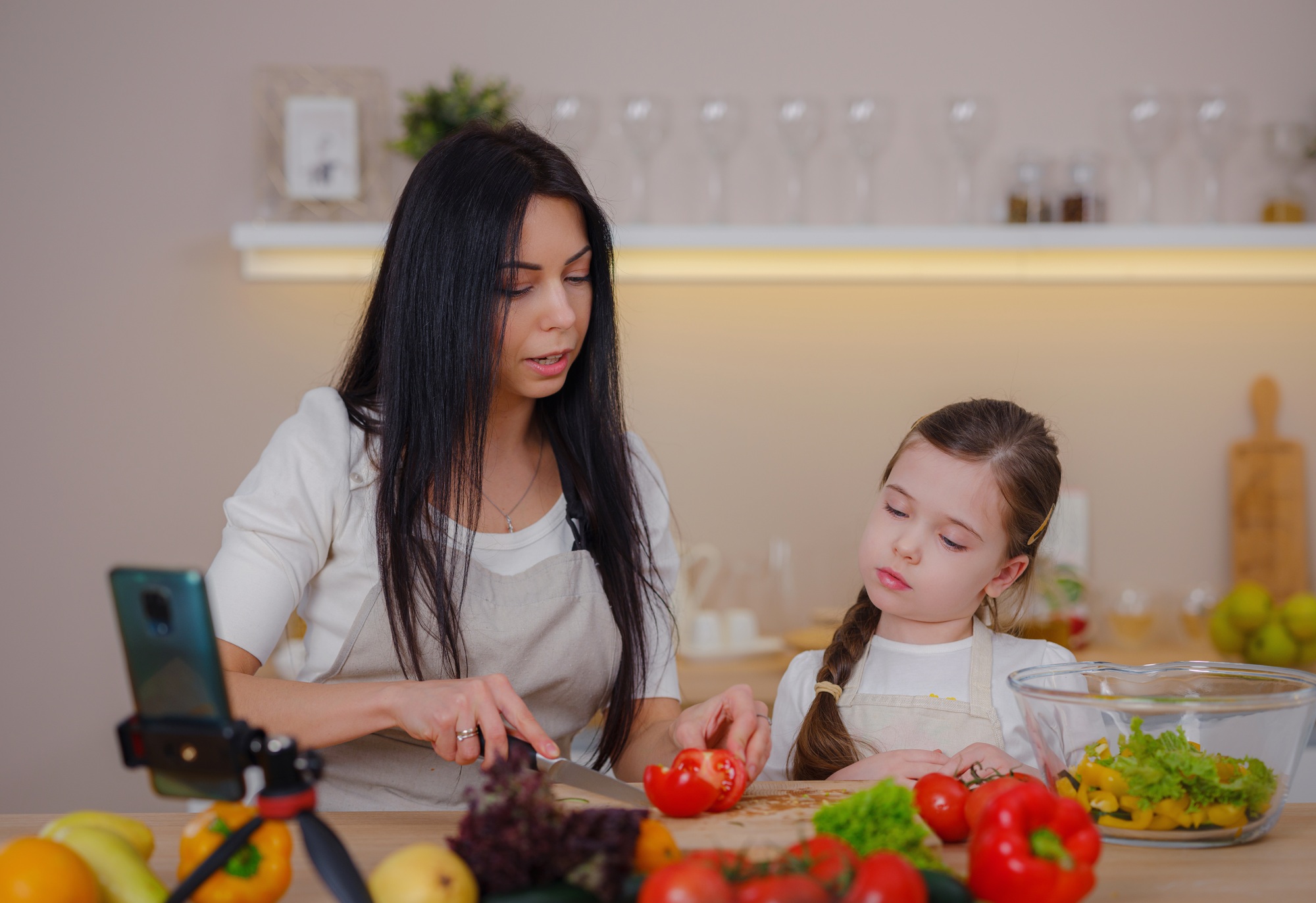 little influencer filming blog about healthy eating