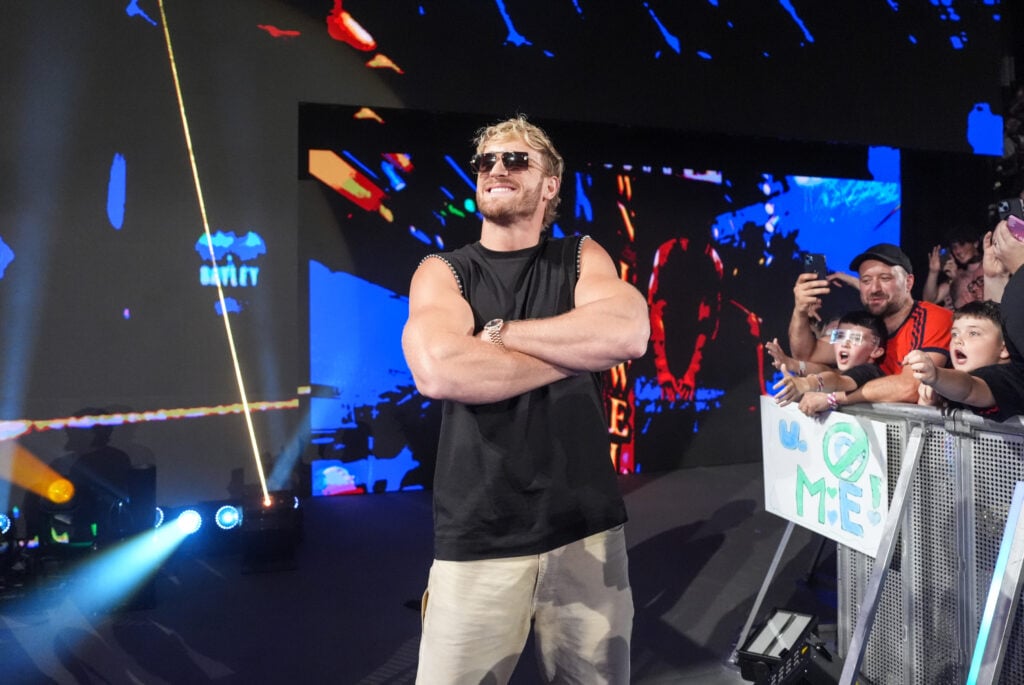 Logan Paul smiles on the ramp as he makes his entrance in Dublin for WWE Smackdown