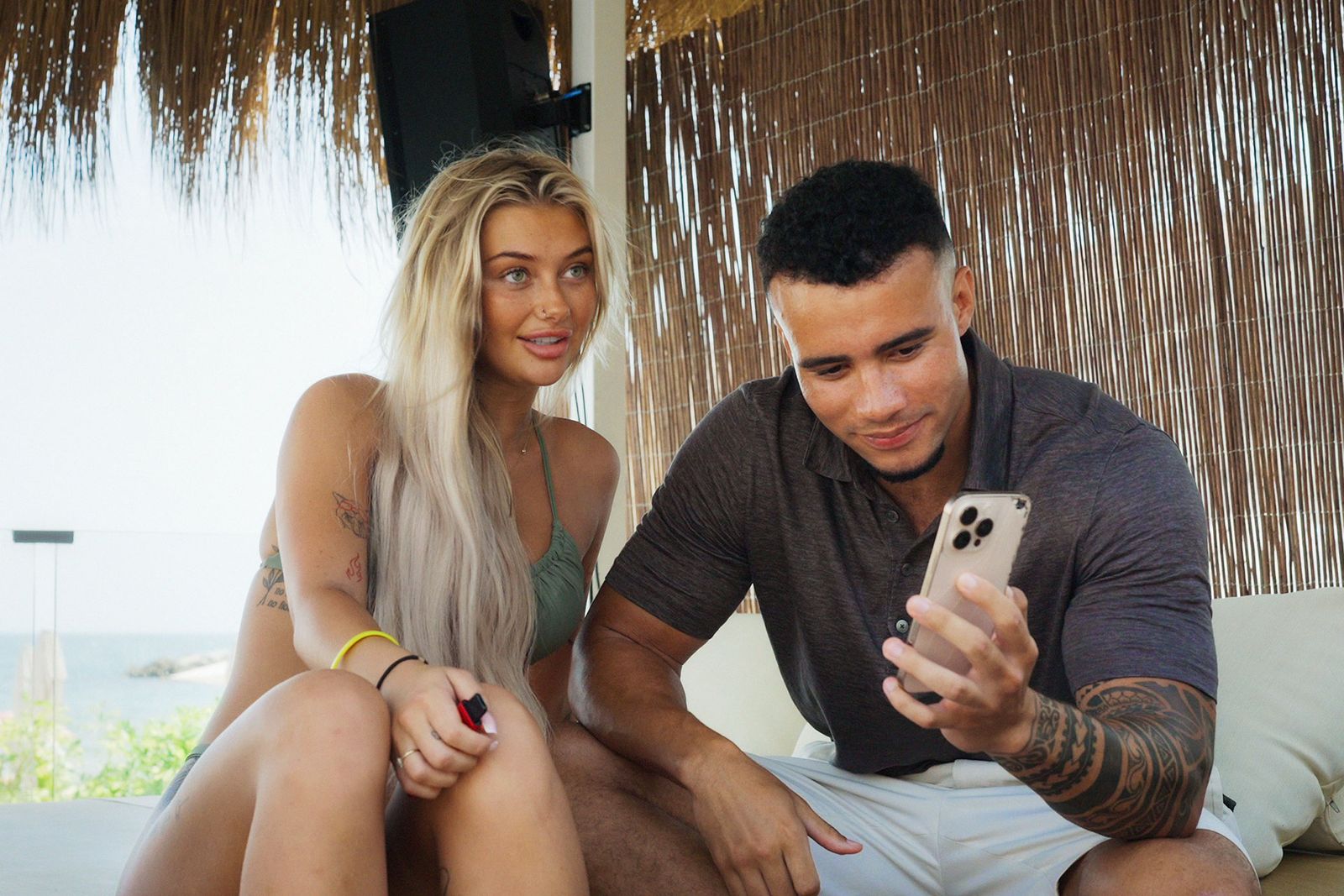 Image may contain Electronics Mobile Phone Phone Face Head Person Photography Portrait Adult Indoors and Blonde